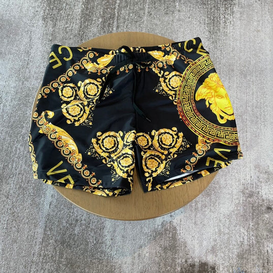 Gold Face Swim Trunks